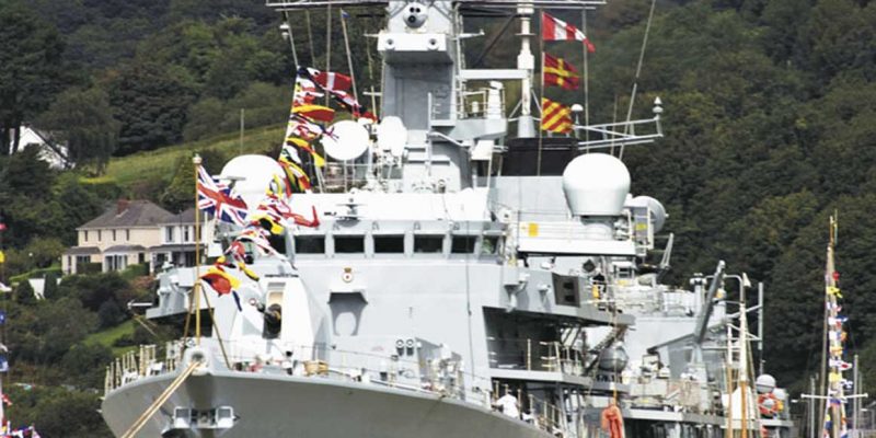 The frigate HMS Somerset showing the flag in home waters. Photo: Nigel Andrews.